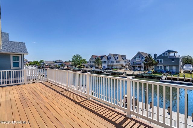 43 S Ensign Dr, Little Egg Harbor, NJ 08087 - wooden deck with a residential view and a water view
