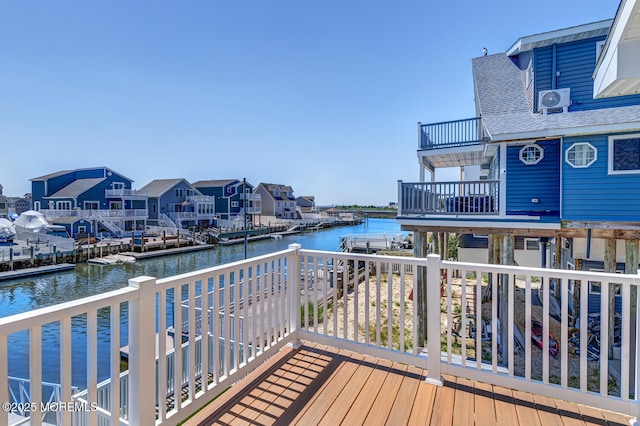 43 S Ensign Dr, Little Egg Harbor, NJ 08087 - wooden deck featuring a water view and a residential view