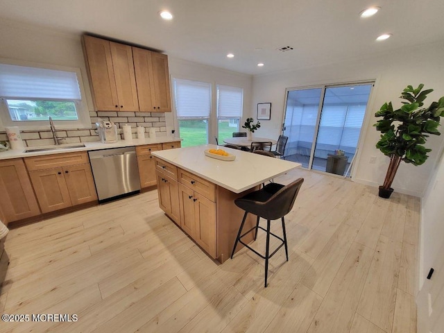 8 Rio Ct, Toms River, NJ 08757 - kitchen featuring stainless steel dishwasher, a sink, a kitchen breakfast bar, light countertops, and recessed lighting