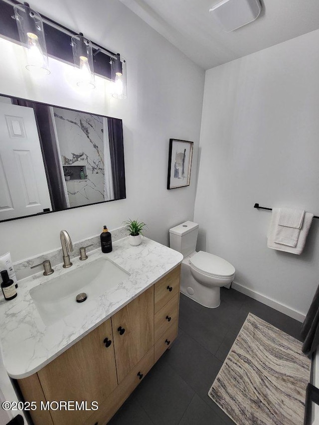 8 Rio Ct, Toms River, NJ 08757 - bathroom featuring vanity, toilet, and tile patterned flooring