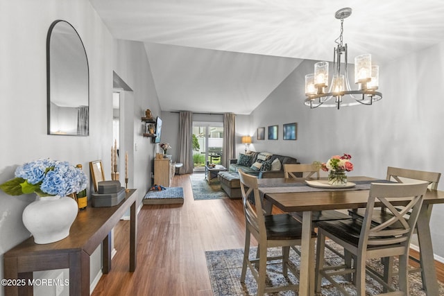 8 Fern Ct, Tinton Falls, NJ 07724 - dining space with a chandelier, wood finished floors, and lofted ceiling