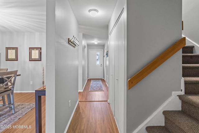 8 Fern Ct, Tinton Falls, NJ 07724 - hall with wood finished floors, stairs, and baseboards
