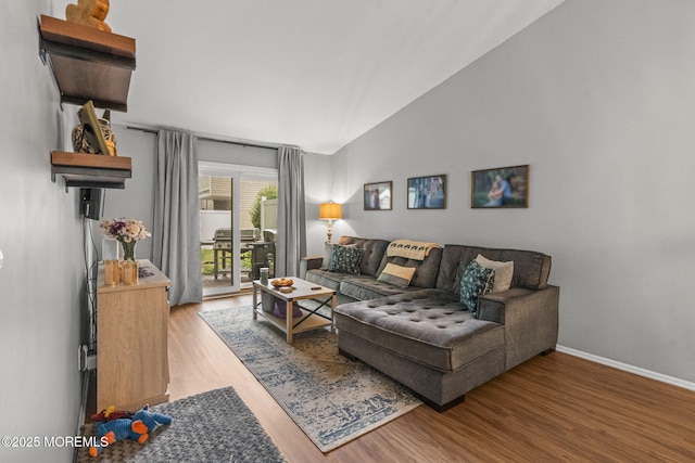 8 Fern Ct, Tinton Falls, NJ 07724 - living room featuring lofted ceiling, wood finished floors, and baseboards