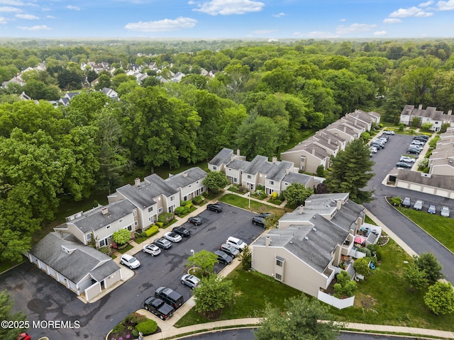 8 Fern Ct, Tinton Falls, NJ 07724 - aerial view of residential area with a heavily wooded area