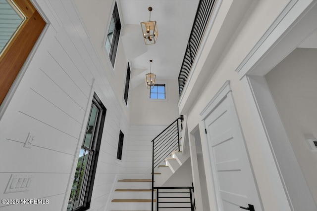 2110 Edgewood Pl, Spring Lake, NJ 07762 - entrance foyer with a high ceiling, stairs, and a chandelier