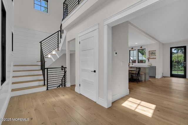 2110 Edgewood Pl, Spring Lake, NJ 07762 - foyer with hardwood / wood-style flooring, stairs, and baseboards