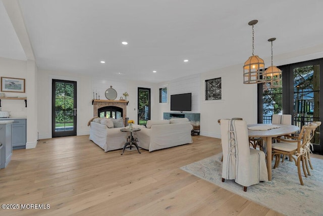 2110 Edgewood Pl, Spring Lake, NJ 07762 - living area featuring light wood-type flooring, a brick fireplace, recessed lighting, and baseboards