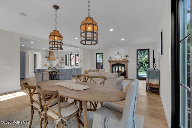 2110 Edgewood Pl, Spring Lake, NJ 07762 - dining area with recessed lighting, light wood-style flooring, baseboards, and a fireplace