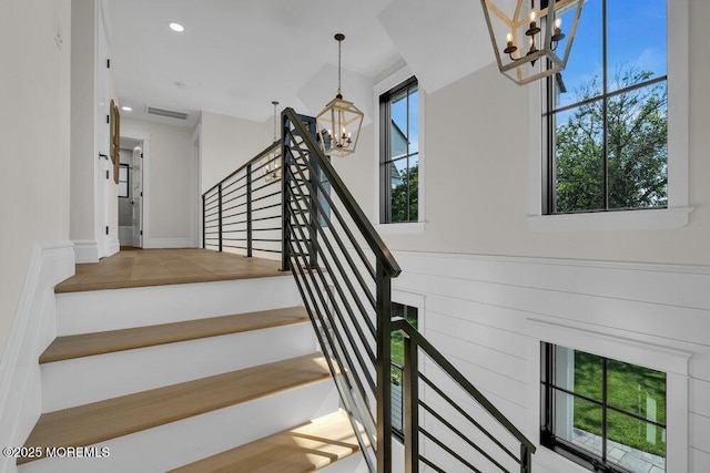 2110 Edgewood Pl, Spring Lake, NJ 07762 - stairway with a chandelier