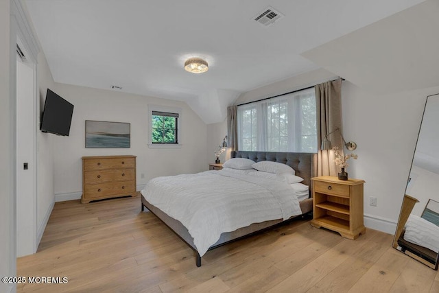 2110 Edgewood Pl, Spring Lake, NJ 07762 - bedroom featuring light wood-type flooring, baseboards, and lofted ceiling