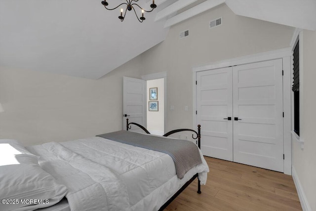 2110 Edgewood Pl, Spring Lake, NJ 07762 - bedroom with a chandelier, light wood finished floors, beamed ceiling, high vaulted ceiling, and a closet