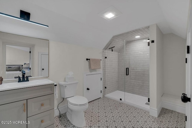2110 Edgewood Pl, Spring Lake, NJ 07762 - ensuite bathroom with lofted ceiling, vanity, a shower stall, toilet, and baseboards