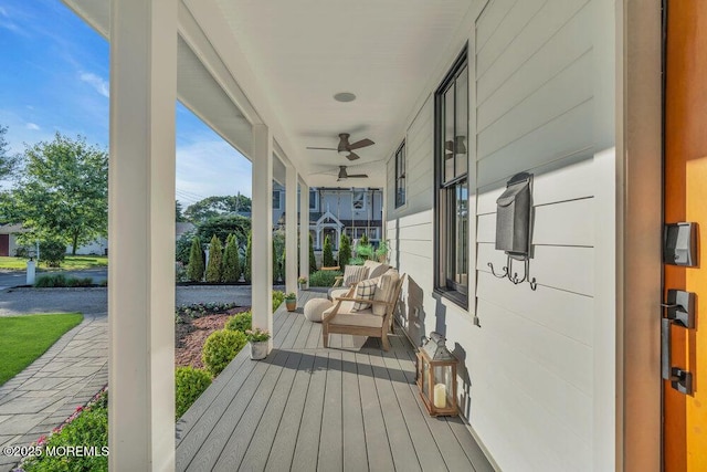 2110 Edgewood Pl, Spring Lake, NJ 07762 - wooden porch with a ceiling fan