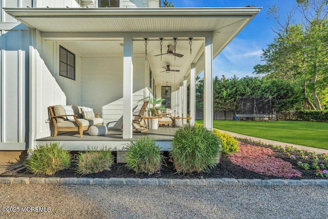 2110 Edgewood Pl, Spring Lake, NJ 07762 - covered porch featuring a trampoline, a yard, and ceiling fan