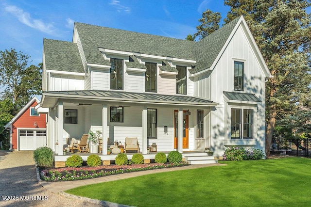 2110 Edgewood Pl, Spring Lake, NJ 07762 - modern inspired farmhouse featuring a standing seam roof, covered porch, a shingled roof, metal roof, and board and batten siding