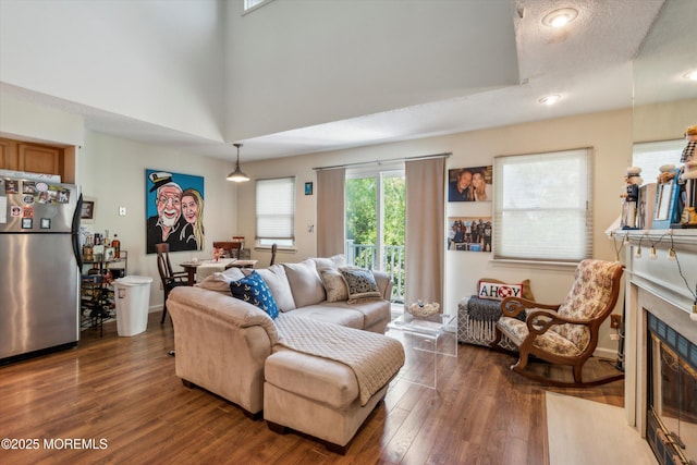 340 E Lacey Rd Unit 40, Forked River, NJ 08731 - living area with wood finished floors and a fireplace