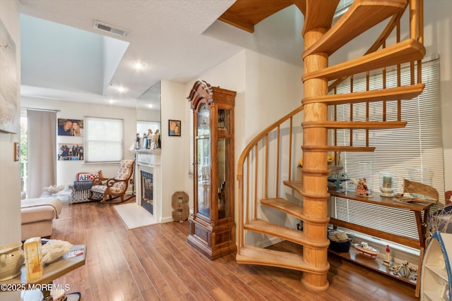 340 E Lacey Rd Unit 40, Forked River, NJ 08731 - stairway with a fireplace, hardwood / wood-style floors, recessed lighting, and baseboards