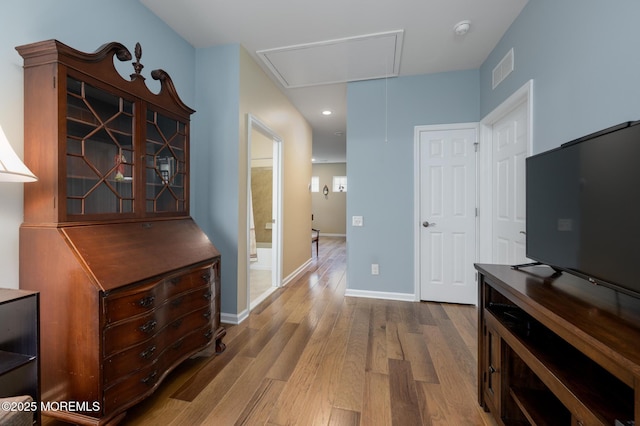 39 Addlestone Ln, Manchester, NJ 08759 - hallway with wood finished floors, baseboards, recessed lighting, and attic access