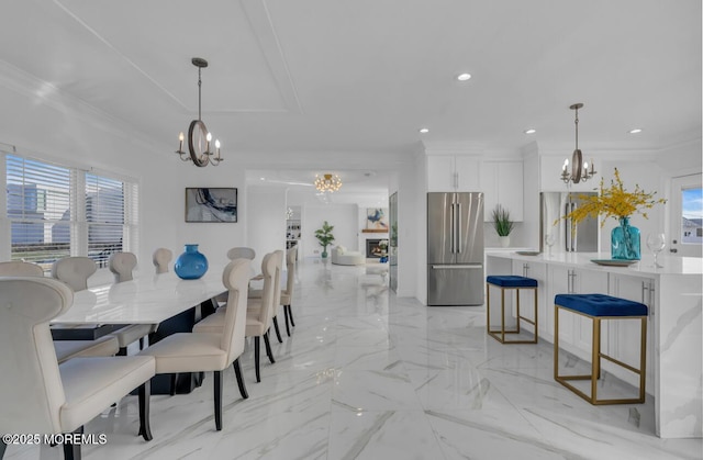 1 Private Dr, Elberon, NJ 07740 - dining room featuring a chandelier, ornamental molding, recessed lighting, and light marble finish flooring