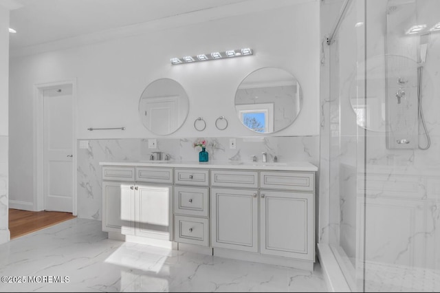 1 Private Dr, Elberon, NJ 07740 - bathroom featuring a marble finish shower, marble finish flooring, double vanity, and ornamental molding