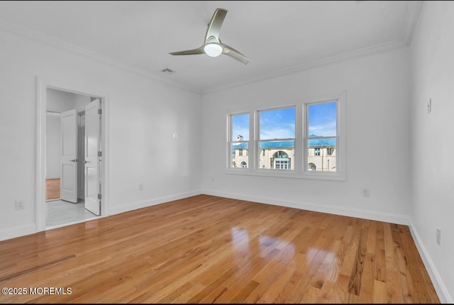 1 Private Dr, Elberon, NJ 07740 - empty room with ornamental molding, light wood-style flooring, a ceiling fan, and baseboards