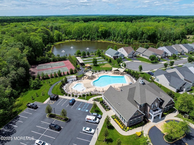 24 Moonlight Way, Howell, NJ 07731 - aerial view of a forest, a pool area, and a nearby body of water