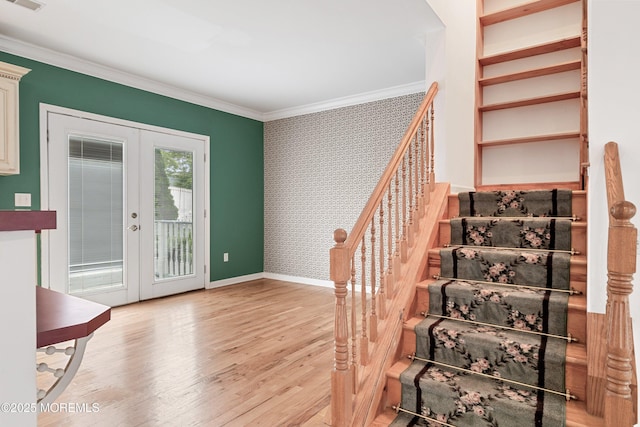 146 Inskip Ave, Ocean Grove, NJ 07756 - stairway featuring french doors, wood finished floors, ornamental molding, wallpapered walls, and baseboards