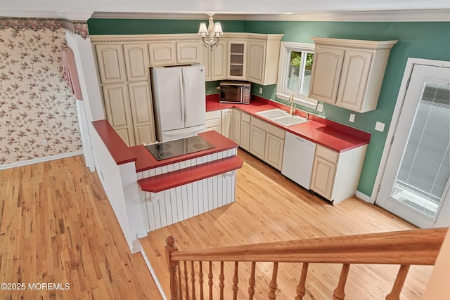 146 Inskip Ave, Ocean Grove, NJ 07756 - kitchen featuring white appliances, cream cabinetry, a sink, light wood-type flooring, and crown molding
