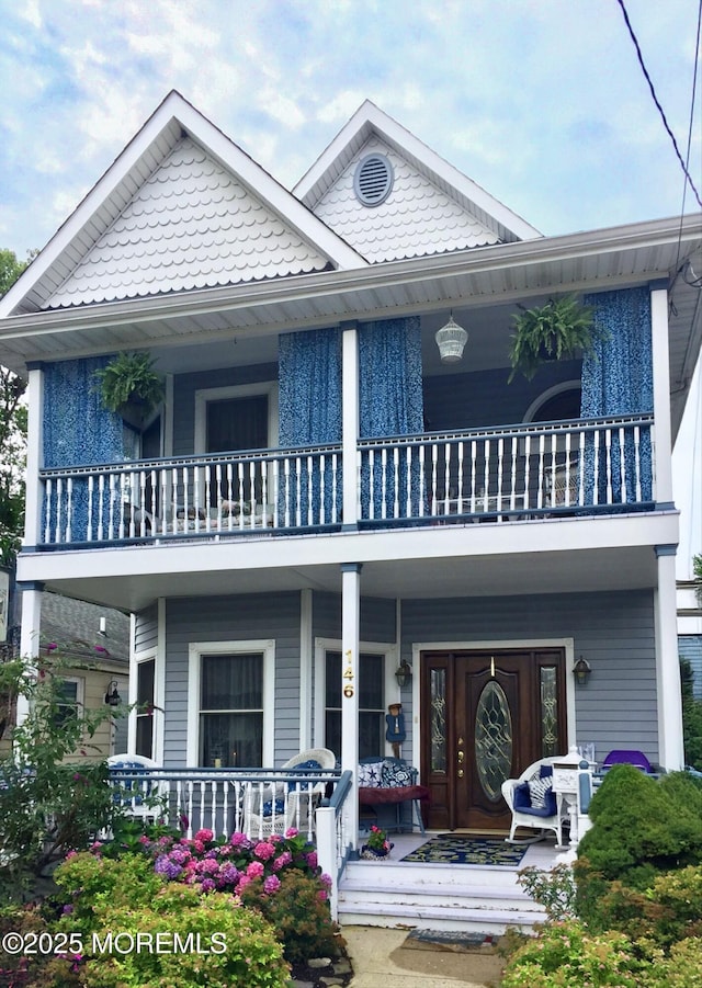146 Inskip Ave, Ocean Grove, NJ 07756 - view of front facade with a balcony and a porch