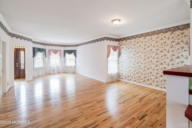 146 Inskip Ave, Ocean Grove, NJ 07756 - empty room featuring crown molding, light wood finished floors, baseboards, and wallpapered walls