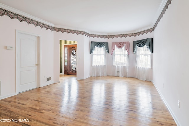 146 Inskip Ave, Ocean Grove, NJ 07756 - unfurnished room featuring light wood-type flooring, ornamental molding, and baseboards