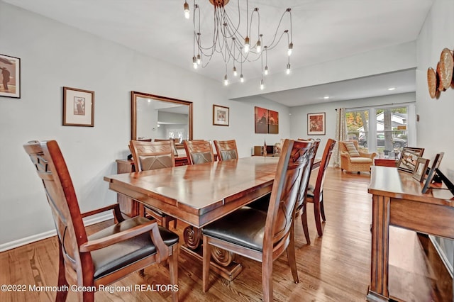 66 Cold Indian Springs Rd, Ocean Twp, NJ 07712 - dining room featuring light wood finished floors, a chandelier, and baseboards