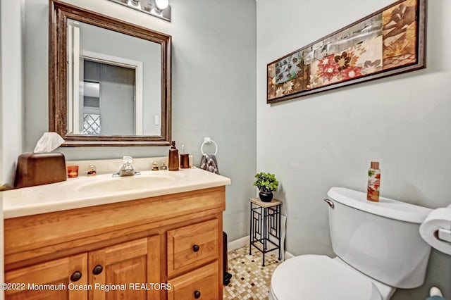 66 Cold Indian Springs Rd, Ocean Twp, NJ 07712 - bathroom with toilet, vanity, and baseboards