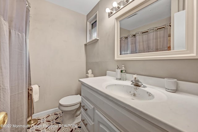 66 Cold Indian Springs Rd, Ocean Twp, NJ 07712 - full bath with vanity, toilet, tile patterned floors, and a shower with shower curtain