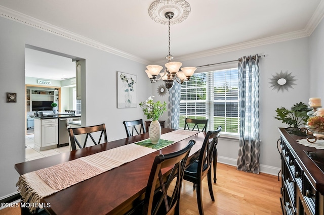 15 Peachstone Rd, Howell, NJ 07731 - dining room with ornamental molding, a chandelier, light wood-type flooring, and baseboards