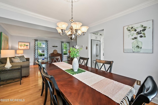 15 Peachstone Rd, Howell, NJ 07731 - dining space with a chandelier, light wood-style floors, crown molding, and baseboards