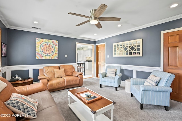 15 Peachstone Rd, Howell, NJ 07731 - living area featuring recessed lighting, ceiling fan, ornamental molding, carpet, and a wainscoted wall