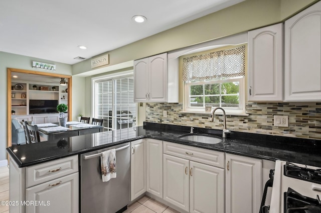 15 Peachstone Rd, Howell, NJ 07731 - kitchen with stainless steel dishwasher, a sink, white cabinets, and recessed lighting