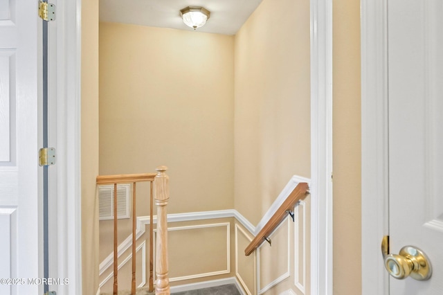 15 Peachstone Rd, Howell, NJ 07731 - stairway featuring a wainscoted wall and a decorative wall