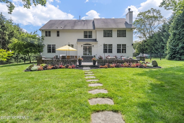 12 Conor Rd, Jackson, NJ 08527 - rear view of house featuring a patio area and a chimney