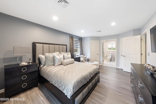 9 Crossridge Cir, Marlboro, NJ 07746 - bedroom featuring light wood-type flooring, recessed lighting, baseboards, and ensuite bathroom