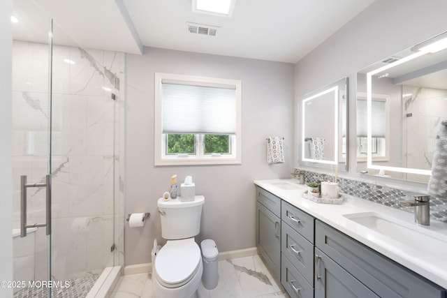 9 Crossridge Cir, Marlboro, NJ 07746 - bathroom featuring marble finish flooring, double vanity, baseboards, toilet, and a marble finish shower