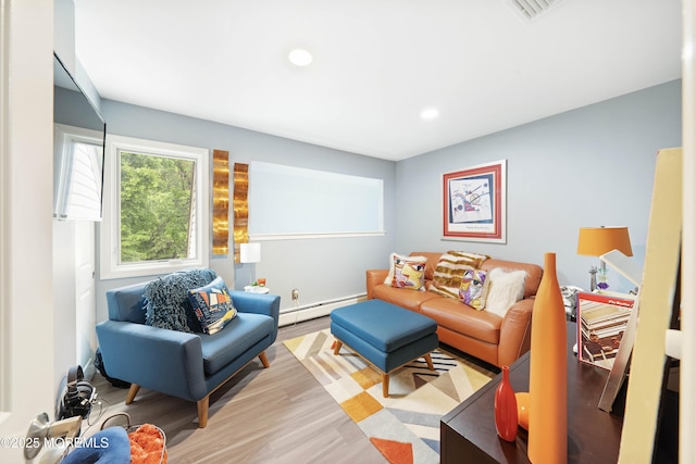 9 Crossridge Cir, Marlboro, NJ 07746 - living area featuring a baseboard radiator, recessed lighting, and wood finished floors