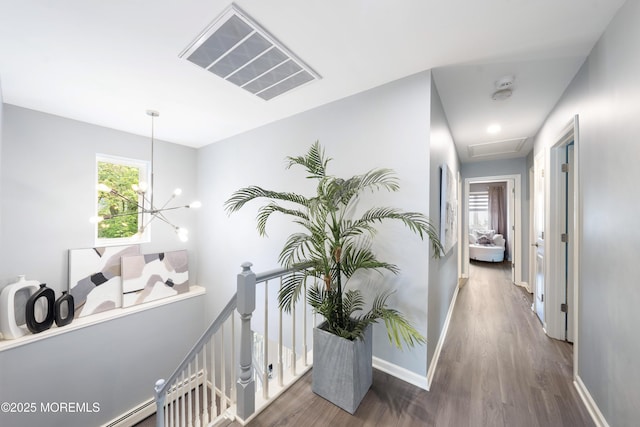 9 Crossridge Cir, Marlboro, NJ 07746 - hall with an upstairs landing, plenty of natural light, and wood finished floors