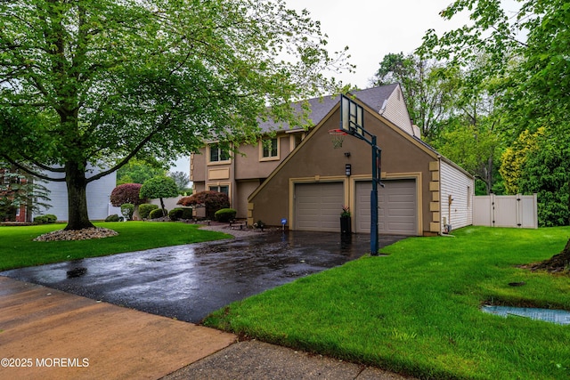 9 Crossridge Cir, Marlboro, NJ 07746 - view of front facade featuring asphalt driveway, a gate, and stucco siding