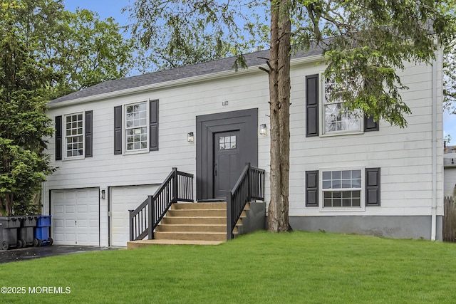 1117 Wake Forest Dr, Toms River, NJ 08753 - view of front of property featuring a front lawn, a garage, and asphalt driveway