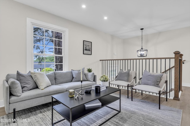 1117 Wake Forest Dr, Toms River, NJ 08753 - living area with wood finished floors, recessed lighting, baseboards, and a chandelier