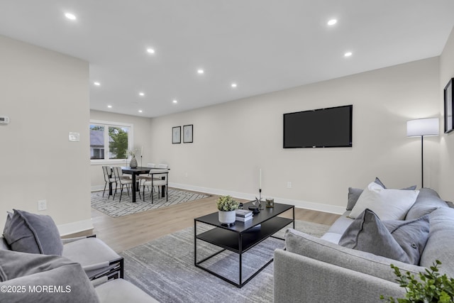 1117 Wake Forest Dr, Toms River, NJ 08753 - living room with light wood finished floors, recessed lighting, and baseboards