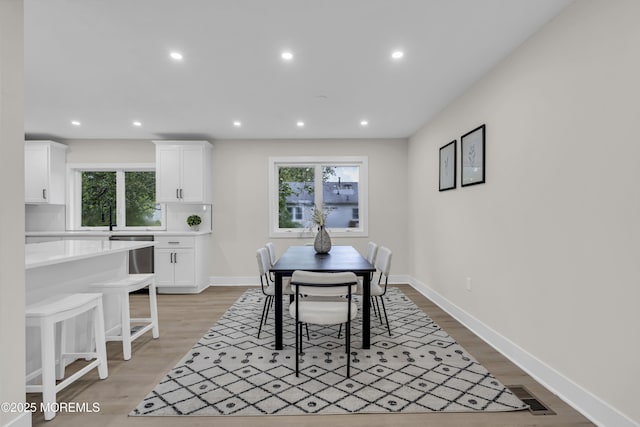 1117 Wake Forest Dr, Toms River, NJ 08753 - dining area featuring plenty of natural light, recessed lighting, light wood-style floors, and baseboards