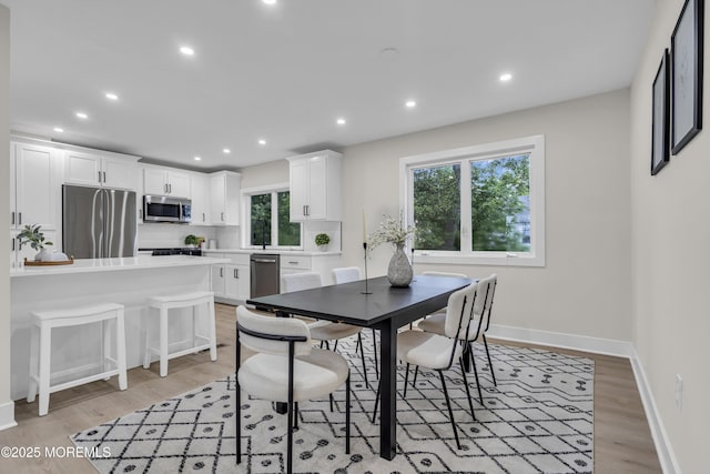 1117 Wake Forest Dr, Toms River, NJ 08753 - dining room featuring light wood-type flooring, recessed lighting, and baseboards